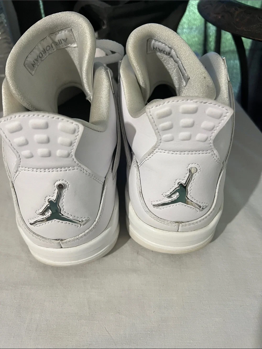 Air Jordan 4 Retro White Leather Sneakers
